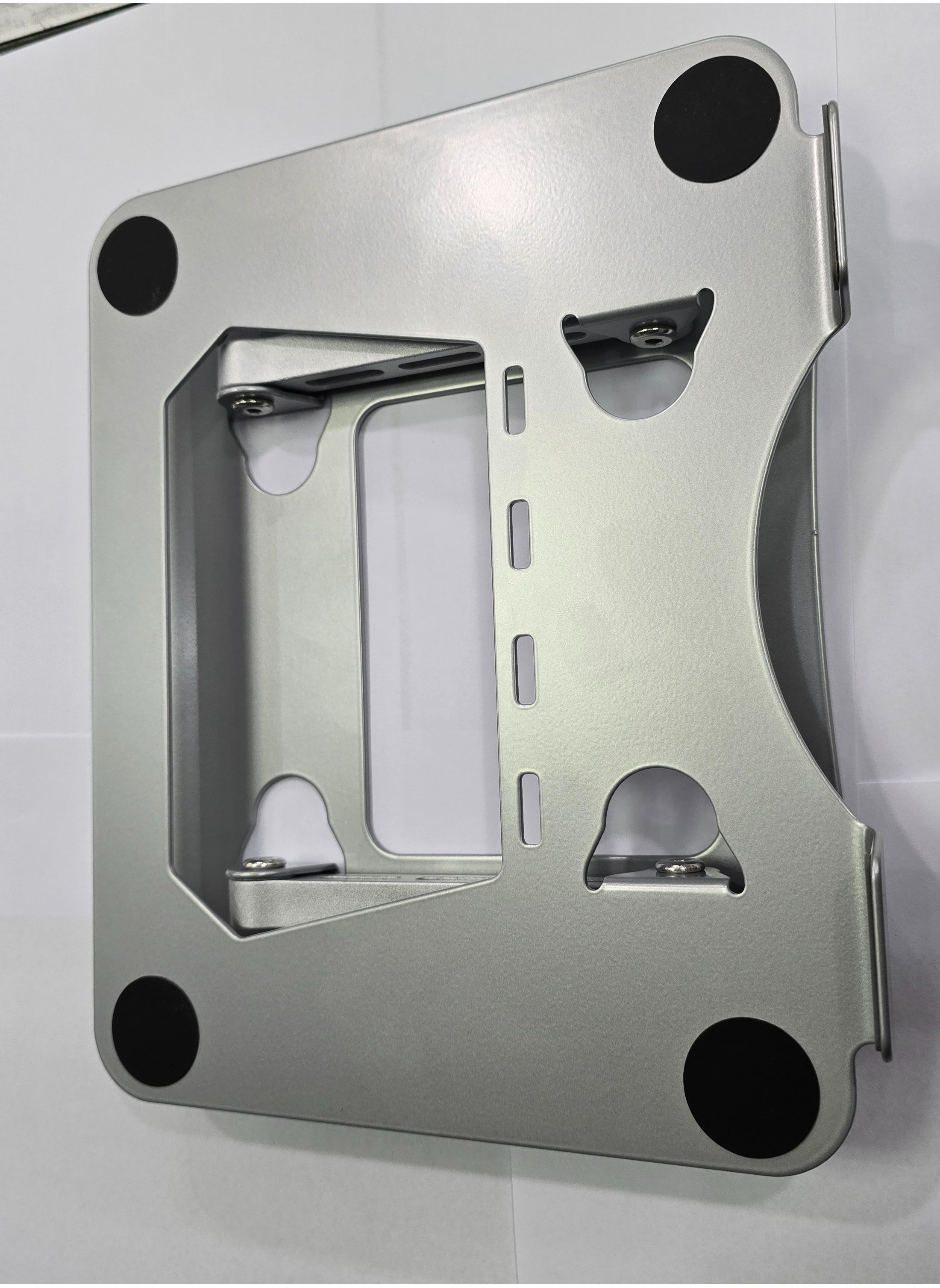 Silver aluminum alloy foldable and adjustable laptop stand, compatible with 14-17 inch laptops, designed for stability and ergonomic support.