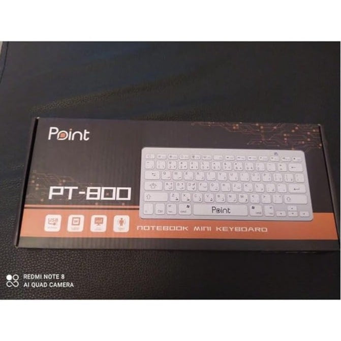 Bluetooth Wireless Keyboard PT-800, compatible with laptops, tablets, and smartphones, featuring ergonomic design and seamless connectivity.
