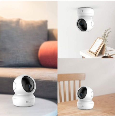 C6N Wi-Fi 2MP 1080P Smart Home Security Camera in white, featuring night vision, motion tracking, and two-way audio for home surveillance.