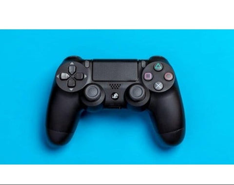 DualShock 4 Wireless Controller for PlayStation 4 in black, featuring an ergonomic design, responsive touchpad, built-in speaker, and wireless connectivity for an enhanced gaming experience